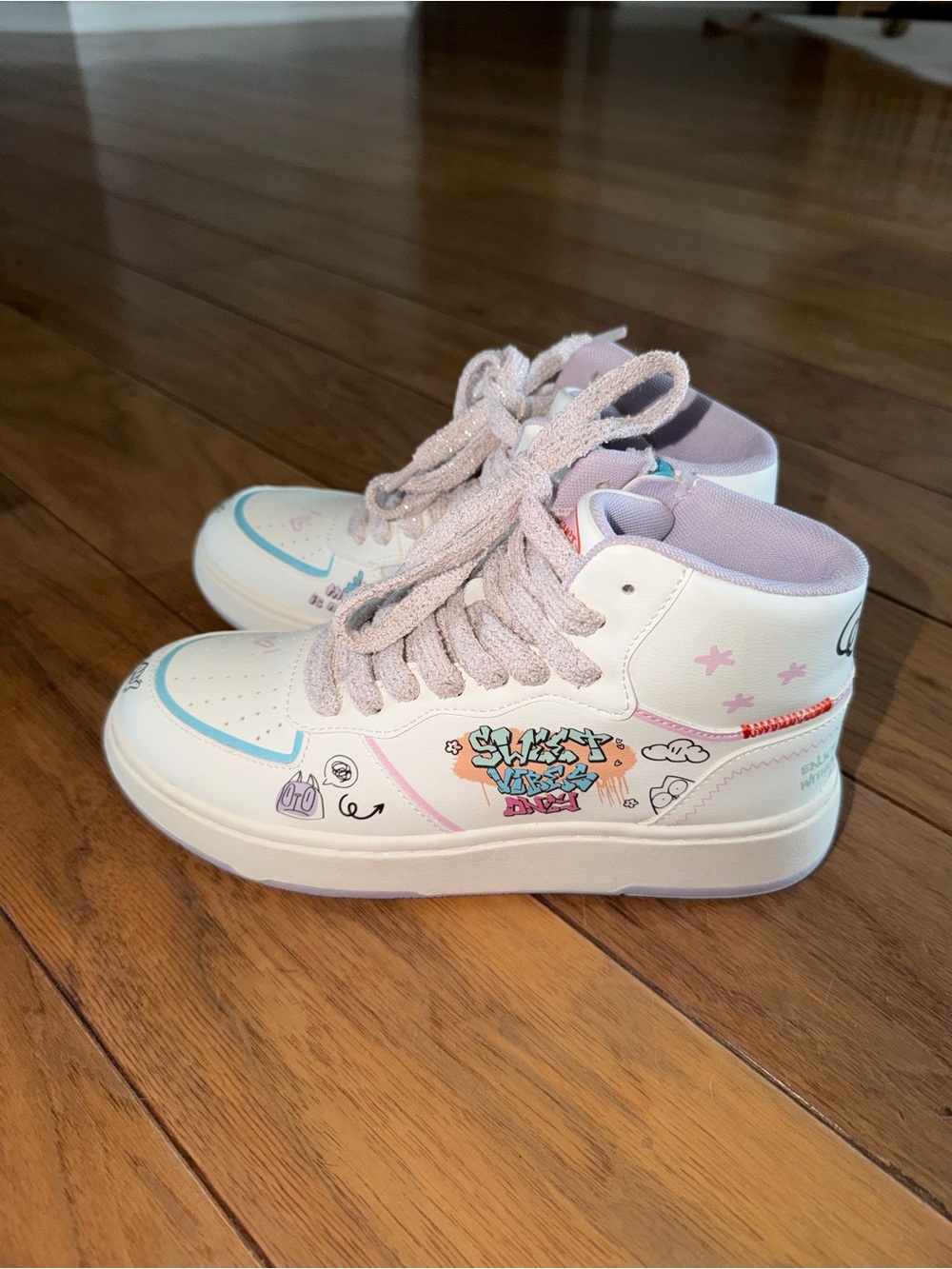 Zara White High-Top Sneakers with Pastel Pink and Light Blue Accents